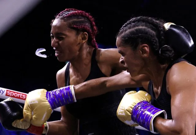 Somalia's Ramla Ali (R) competes with Dominican Crystal Nova during a super-bantamweight boxing match at the King Abdullah Sports City Arena in the Saudi Red Sea city of Jeddah, on August 20, 2022. Somali-born Briton Ramla Ali won the first professional women's boxing match held in Saudi Arabia with a spectacular first-round knock-out of Crystal Garcia Nova today. (Photo by Andrew Couldridge/Action Images via Reuters)