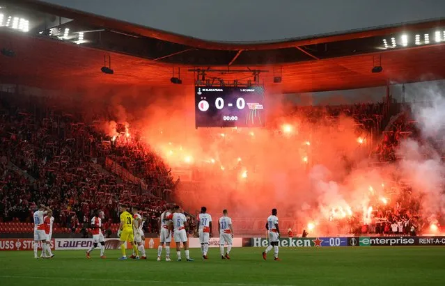 Fans with flares in the stands before the Europa Conference League match between Slavia Prague and Union Berlin in Prague, Czech Republic on September 16, 2021. (Photo by David W. Cerny/Reuters)