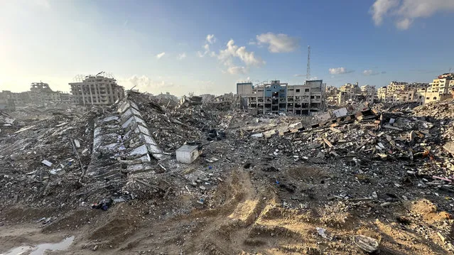 A view of the destruction with destroyed buildings and roads after Israeli Forces withdrawn from the areas in Gaza City, Gaza on February 07, 2024. Extensive devastation unfolded as a result of weeks of continuous Israeli bombardment after Karameh withdrawn. The combination of bulldozer activity and air strikes resulted in the transformation of the region into a landscape of rubble and ash. The aftermath of the Israeli withdrawal from the city revealed the destruction that had befallen the area. (Photo by Abdulqader Sabbah/Anadolu via Getty Images)