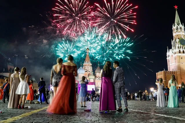 School leavers celebrate their graduation in Moscow's Red Square in Moscow, Russia on June 20, 2019. (Photo by Artyom Geodakyan/TASS)