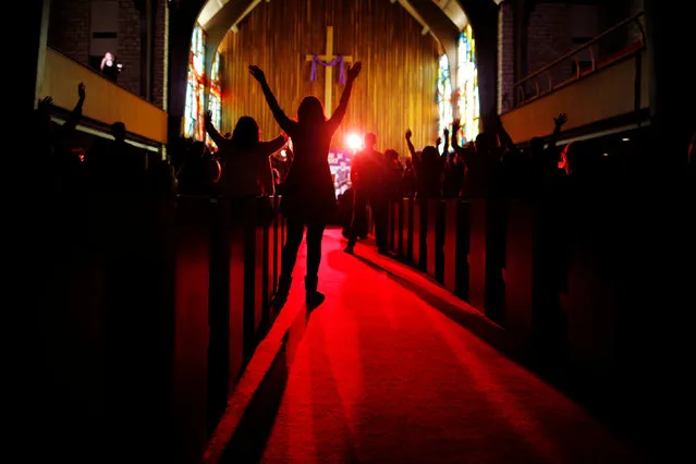 Audience members react during the Exalt Showcase of gospel and Christian music at Central Presbyterian Church at the South by Southwest (SXSW) Music Film Interactive Festival 2017 in Austin, Texas, U.S., March 14, 2017. (Photo by Brian Snyder/Reuters)