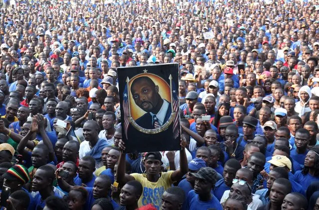 Thousands of supporters of the Congress for Democratic Change (CDC) party petition former Liberian soccer player and current Senator George Weah to contest Liberia's Presidential elections in 2017, at Party headquarters in Monrovia, Liberia, 28 April 2016. George Weah contested the 2005 and 2011 Presidential elections, but lost to incumbent Ellen Johnson Sirleaf on both occasions. Sirleaf's second term in office will end in 2017. (Photo by Ahmed Jallanzo/EPA)