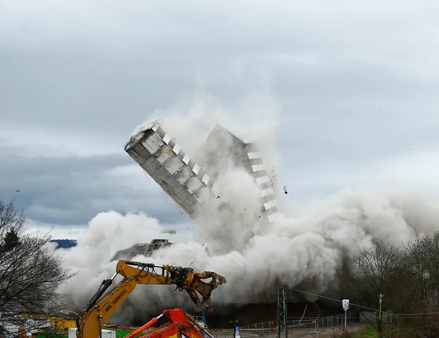 The Bonn Center topples during a controlled demolition in Bonn, Germany, March 19, 2017. (Photo by Thilo Schmuelgen/Reuters)