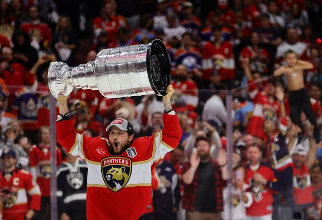 Florida Panthers forward Sam Reinhart (13) hoists the Stanley Cup after defeating the Edmonton Oilers in game seven of the 2024 Stanley Cup Final in Sunrise, Florida on June 25, 2024. (Photo by Sam Navarro/USA TODAY Sports)