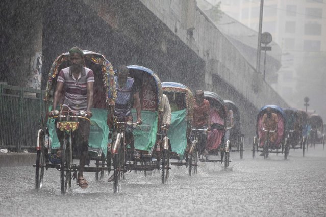 After days of intense heat, Dhaka city witnessed heavy rain and thunderstorms during the monsoon season on Wednesday, June 26, 2024. (Photo by Md Rakibul Hasan Rafiu/NurPhoto/Rex Features/Shutterstock)