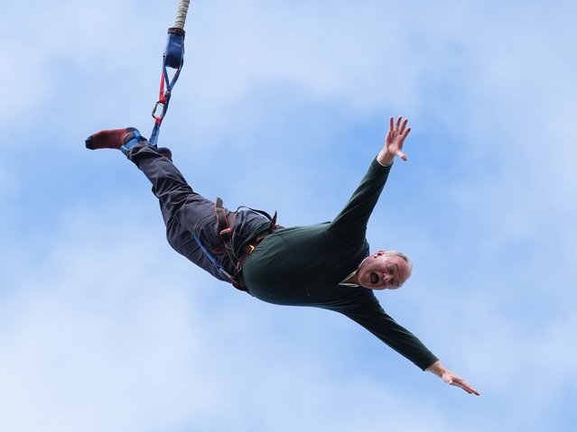 Liberal Democrat leader Sir Ed Davey taking part in a bungee jump during a visit to Eastbourne Borough Football Club in East Sussex on Monday, July 1, 2024, while on the General Election campaign trail. (Photo by Gareth Fuller/PA Images via Getty Images)