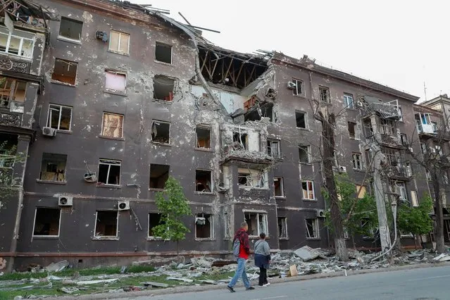 A view shows a residential building heavily damaged during Ukraine-Russia conflict in the southern port city of Mariupol, Ukraine on May 3, 2022. (Photo by Alexander Ermochenko/Reuters)