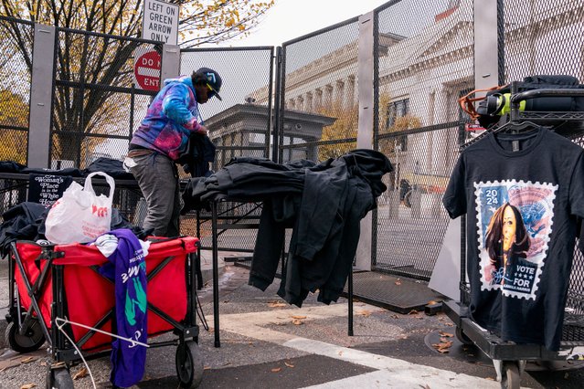 A vendor unpacks merchandise with a theme of Democratic presidential nominee Vice President Kamala Harris near the White House ahead of the presidential election in Washington on November 4, 2024. (Photo by Nathan Howard/Reuters)