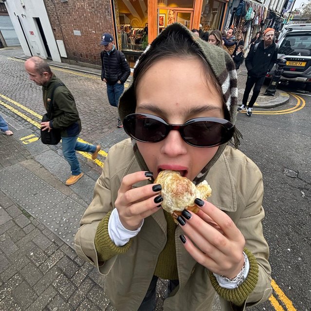 American singer-songwriter Olivia Rodrigo in the second decade of November 2024 indulges in a sausage roll while celebrating her Grammy nomination. (Photo by oliviarodrigo/Instagram)