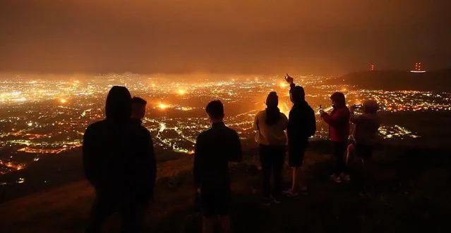 A view from Cavehill overlooking Belfast city on July 12, 2022 of loyalist bonfires burning as part of the traditional Twelfth commemorations marking the anniversary of the Protestant King William's victory over the Catholic King James at the Battle of the Boyne in 1690. (Photo by Niall Carson/PA Images via Getty Images)