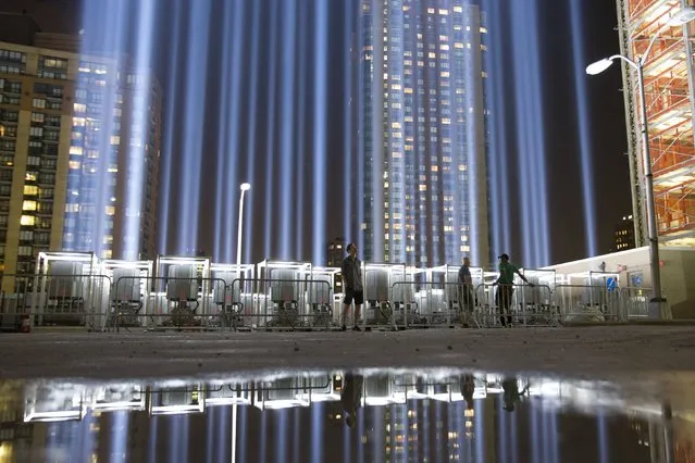 People gather at the “Tribute in Light” in Lower Manhattan, New York, September 9, 2015. (Photo by Andrew Kelly/Reuters)
