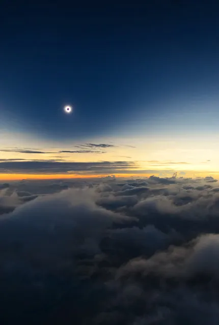 “Totality From Above the Clouds”. A fantastic view of one of nature's greatist spectacles, a total solar eclipse, taken from an airplane, 3200m above Turkana Kenya. The photographer was due to shoot this rare occurrence from the eastern shore of Lake Turkan but a huge sand-storm hit the region forty minites befor totality. (Photo by Catalin Beldea, Romania/The Astronomy Photographer of the Year 2014 Contest)