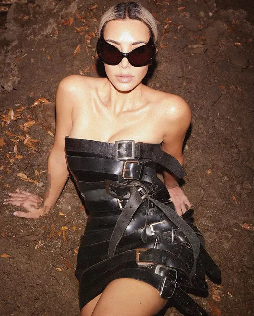American media personality and socialite Kim Kardashian in the first decade of October 2022 gets all tied up in belts. (Photo by kimkardashian/Instagram)