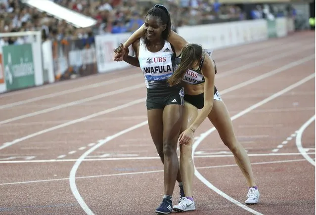 Athletics, IAAF Athletics Diamond League meeting Lausanne, Stade Olympique de la Pontaise, Lausanne, Switzerland on August 25, 2016. Lydia Wafula of Kenia (L) helps Alexa Efraimson of the U.S. following the women's 3,000m competition. (Photo by Denis Balibouse/Reuters)