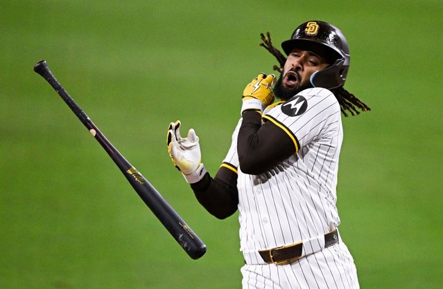 San Diego Padres' Fernando Tatis Jr. (23) is hit with a pitch during the seventh inning of a baseball game against the Chicago Cubs, Monday, April 14, 2025, in San Diego, Calif. (Photo by Denis Poroy/AP Photo)