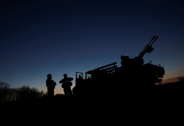 Servicemen from anti-drone mobile air defence unit of 115th Separate Mechanized Brigade of the Ukrainian Armed Forces are seen at their position, amid Russia's attack on Ukraine, in Donetsk region, Ukraine on April 15, 2025. (Photo by Anatolii Stepanov/Reuters)