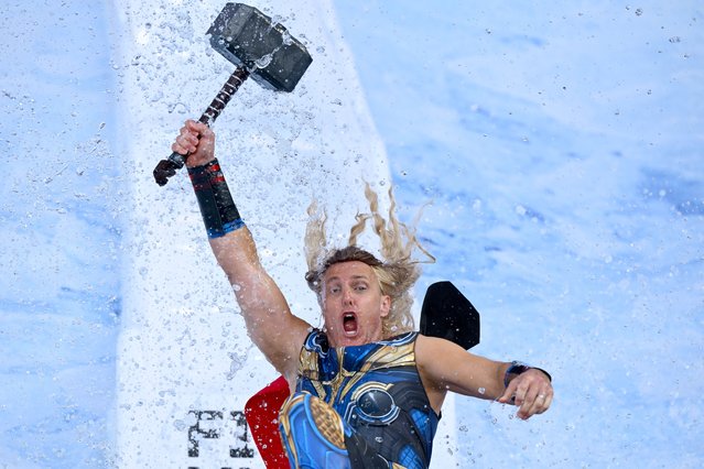 Former Australian sprinter and television presenter Matt Shirvington goes down the slide for FightMND Big Freeze 11 ahead of the round 13 AFL match between Melbourne Demons and Collingwood Magpies at Melbourne Cricket Ground, on June 09, 2025, in Melbourne, Australia. (Photo by Quinn Rooney/Getty Images)