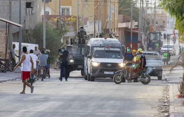 Security forces patrol at streets as streets remain silent due to coronavirus (Covid-19) pandemic in Gabes, Tunisia on August 21, 2020. (Photo by Nacer Talel/Anadolu Agency via Getty Images)