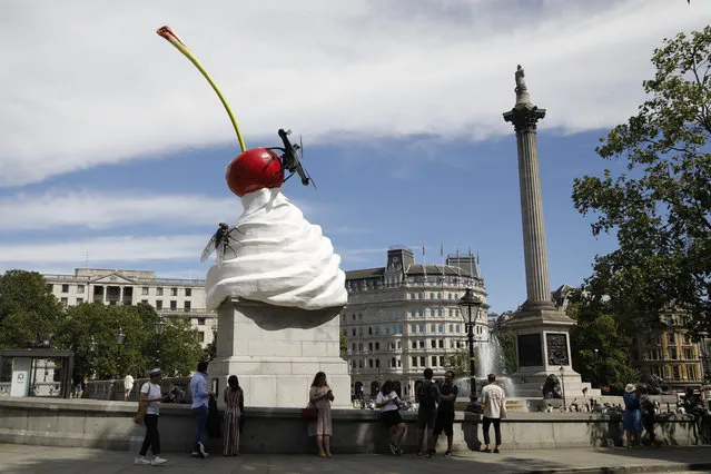 A new work of art entitled “The End” by British artist Heather Phillipson was unveiled on the fourth plinth in Trafalgar Square in London on July 30, 2020. (Photo by Tolga Akmen/AFP Photo)