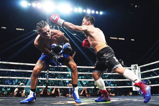 Mario Barrios, left, fights Manny Pacquiao in a welterweight title boxing match Saturday, July 19, 2025, in Las Vegas. (Photo by John Locher/AP Photo)