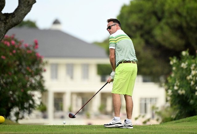 Ant McPartlin was seen enjoying a casual round of golf while on holiday in Portugal on July 23, 2025. The TV host teed off on the first hole while vaping, but his first swing sent the ball flying dangerously close to his parked car. (Photo by Backgrid UK)