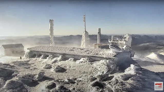 A view from the top of the observatory tower at Mount Washington State Park, where the wind chill dropped to 105 degrees below zero Fahrenheit (–79 Celsius) is seen in a still image from a live camera in New Hampshire, U.S. February 4, 2023. (Photo by Mount Washington Observatory/mountwashington.org/Handout via Reuters)