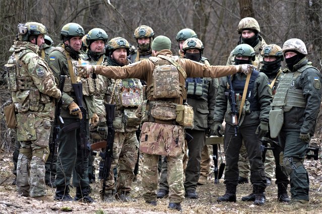 Ukrainian servicemen attend combat training in Kyiv region, Ukraine, Friday, March. 3, 2023. (Photo by Efrem Lukatsky/AP Photo)