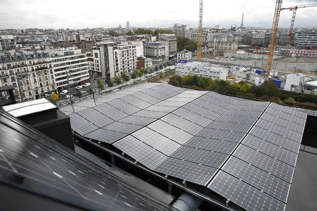 A general view shows solar panels installed in the "eco-neighbourhood" Clichy-Batignolles, one of several new ecological housing developments with low energy use and carbon emissions, in Paris, France, October 22, 2015. The city of Paris presented its latest "eco-neighbourhood" ahead of the COP21, the World Climate Summit from November 30 to December 11, 2015. (Photo by Benoit Tessier/Reuters)