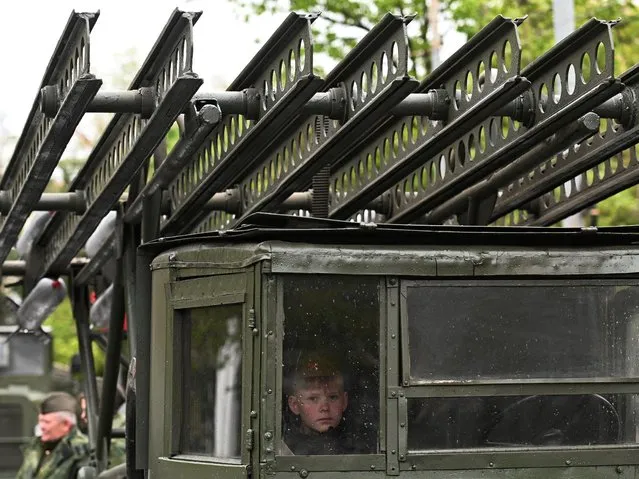Participants get prepared before a military parade on Victory Day, which marks the 78th anniversary of the victory over Nazi Germany in World War Two, in Rostov-on-Don, Russia on May 9, 2023. (Photo by Sergey Pivovarov/Reuters)