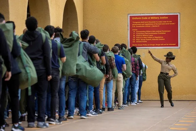 Drill instructor Staff Sergeant Ayesha Zantt instructs female recruits at they begin the first ever integrated basic training at Marine Corps Recruiting Depot, San Diego in San Diego, California, U.S., February 9, 2021. (Photo by Mike Blake/Reuters)