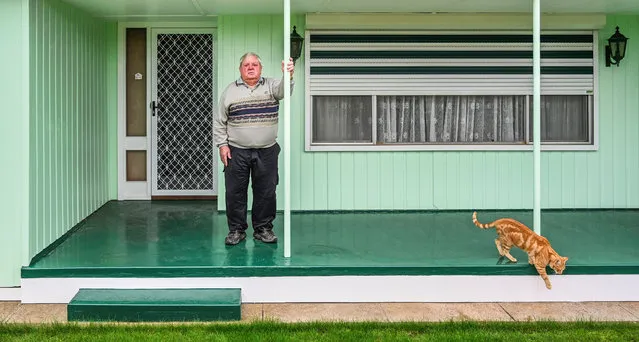 “Ern, Cat and Verandah”. Ern Hendry lives in Point Turton on Yorke Peninsula in South Australia. (Photo by Karen Waller/International Portrait Photographer of the Year)