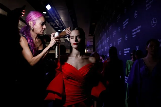 A model prepares for the Hannibal Laguna show during the Mercedes Benz Fashion Week in Madrid, Spain on September 16, 2022. (Photo by Susana Vera/Reuters)