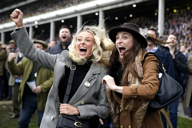 Racegoers react as Lossiemouth ridden by Paul Townend wins the Close Brothers Mares' Hurdle on day one of the 2024 Cheltenham Festival at Cheltenham Racecourse on day one of the 2024 Cheltenham Festival at Cheltenham Racecourse on Tuesday, March 12, 2024. (Photo by Andrew Matthews/PA Images via Getty Images)