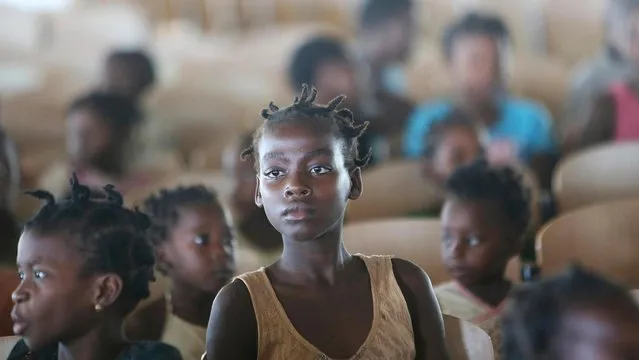 A young girl at a temporary shelter for children in Pemba city, on the northeastern coast of Mozambique, Thursday May 2, 2019. More than 1 million children have been affected by a pair of cyclones that ripped into Mozambique in less than two months, the United Nations children's agency says, and now many of the children are without shelter or food. (Photo by Tsvangirayi Mukwazhi/AP Photo)