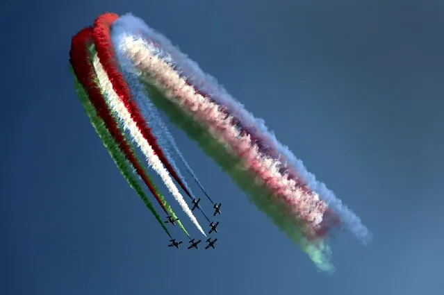 Al Fursan, the United Arab Emirates Air Force's aerobatic team, performs during the UAE 50th National Day Al Fursan, at EXPO 2020 Dubai, in Dubai, United Arab Emirates, Thursday, December 2, 2021. (Photo by Kamran Jebreili/AP Photo)