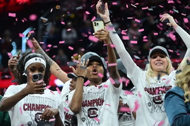 South Carolina Gamecocks guard Bree Hall (center) reacts during the trophy presentation after defeating the Iowa Hawkeyes in the finals of the Final Four of the women's 2024 NCAA Tournament on April 7, 2024. (Photo by Ken Blaze/USA TODAY Sports)