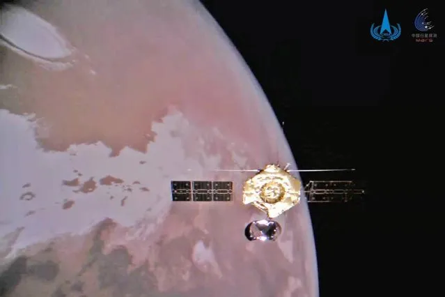 A handout photo released by the China National Space Administration (CNSA) on 01 January 2022 and taken by the Tianwen-1 Mars mission shows the orbiter flying around the Red Planet in an orbit (issued 02 January 2022). The CNSA published on 01 January four pictures taken by its Tianwen-1 Mars mission, including the first full photo of the mission orbiter. The orbiter's full picture was taken by a camera released by the craft, which is now about 350 million kilometers away from Earth, CNSA said in a statement. Launched in July 2020 from the Wenchang Space Launch Center in Hainan province, the Tianwen-1 robotic probe, named after an ancient Chinese poem, traveled a total of 475 million kilometers and carried out several trajectory maneuvers before entering Martian orbit on 10 February 2021. After over three months of preparations, a landing capsule released by the probe descended through the Martian atmosphere in an extremely challenging landing process and finally touched down on the Red Planet on 15 May 2021, making China the second country, after the United States, to have successfully conducted Martian landing. (Photo by CNSA/Handout via EPA/EFE)