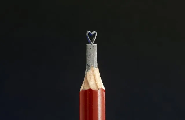 A heart-shaped miniature sculpture, created by self-taught artist Jadranko Djordjevic on a graphite pencil, is seen in Tuzla, Bosnia and Herzegovina April 26, 2016. (Photo by Dado Ruvic/Reuters)