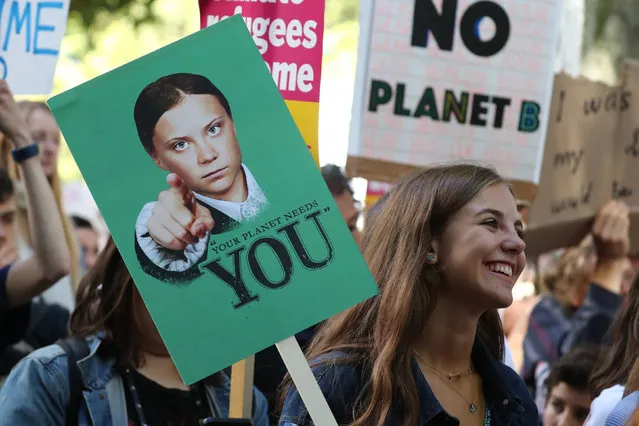 A climate change protester listening to speakers at the UK Student Climate Network's Global Climate Strike in London, England on September 20, 2019. (Photo by Gareth Fuller/PA Images via Getty Images)