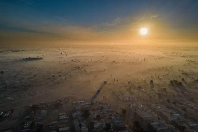 Polluted New Year by Eliud Gil Samaniego, Mexicali, Baja California, Mexico. Sustainable cities prize: On 1 January 2018 Mexicali was one of the most contaminated cities in the world because of climate change, its geographical location, industry and cars. (Photo by Eliud Gil Samaniego/CIWEM Environmental Photographer of the Year 2019)