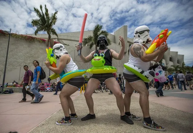 Cosplay enthusiasts pose for photos during the 2015 Comic-Con International Convention in San Diego, California July 10, 2015. (Photo by Mario Anzuoni/Reuters)