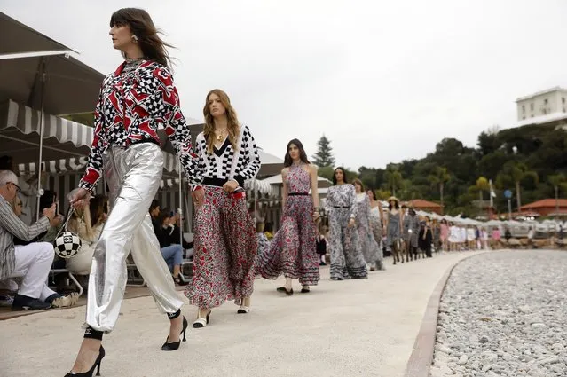Models present a variety of creations from the Chanel Cruise 2022-23 Collection during a fashion show in Monaco, 05 May 2022. (Photo by Sebastien Nogier/EPA/EFE)