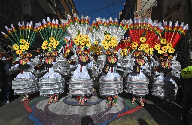 Dancers of the Morenada fraternity perform during the Jesus del Gran Poder (Jesus of the Great Power) religious festival, in La Paz, on June 3, 2023. The Jesus del Gran Poder festival was declared Cultural Intangible Heritage of Humanity by Unesco in 2019. (Photo by Aizar Raldes/AFP Photo)