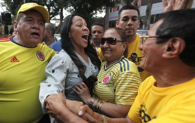 Marelen Castillo (C), the vice-presidential candidate of independent presidential contender Rodolfo Hernandez, greets supporters during a campaign rally in Cali, Colombia, 06 June 2022. Colombians will be able to elect Ivan Duque's successor on 19 June in the second presidential round between the Historic Pact candidate Gustavo Petro and the independent candidate Rodolfo Hernandez. (Photo by Ernesto Guzman Jr./EPA/EFE)