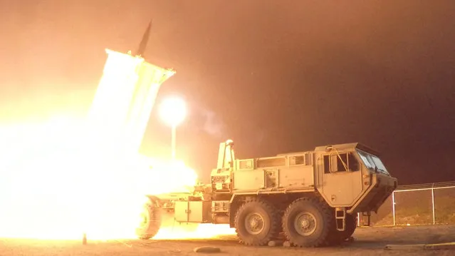 A Terminal High Altitude Area Defense (THAAD) interceptor is launched from the Pacific Spaceport Complex Alaska during Flight Experiment THAAD (FET)-01 in Kodiak, Alaska, U.S. on July 30, 2017. The medium-range ballistic missile was detected, tracked and intercepted, military bosses have revealed. The test is seen as a show of force two days after Kim Jong-un launched his latest missile – and then bragged it could hit anywhere in America. (Photo by Courtesy Leah Garton/Reuters/Missile Defense Agency)