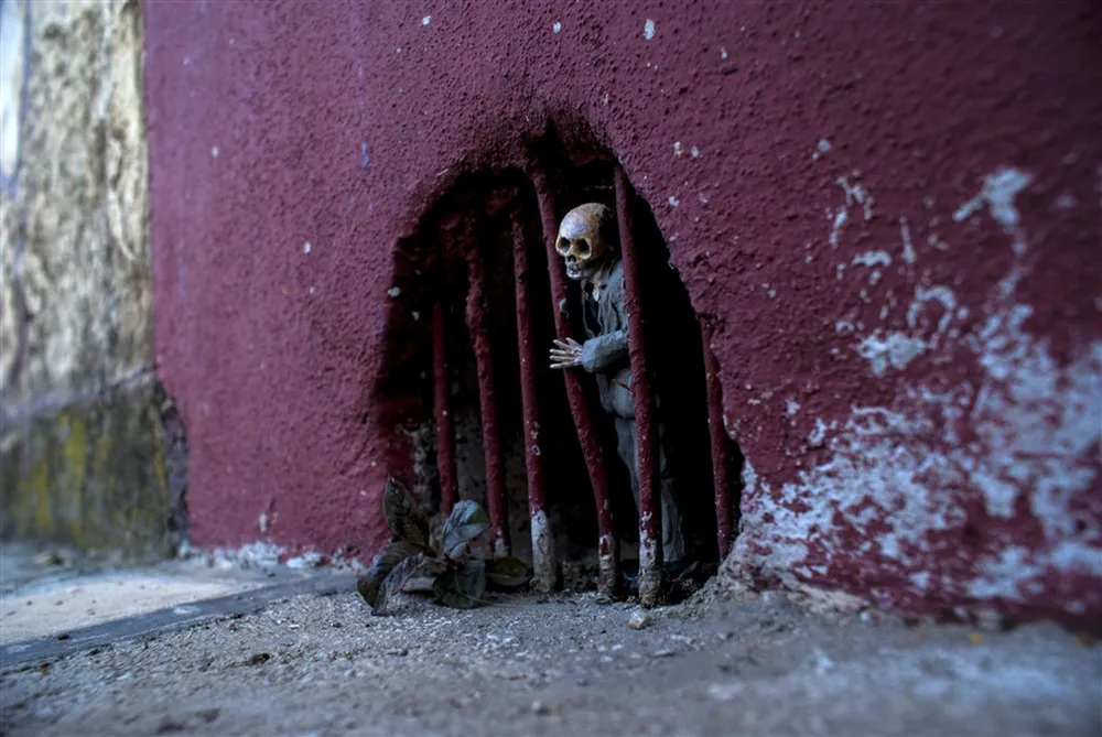 Cement Eclipses by Isaac Cordal