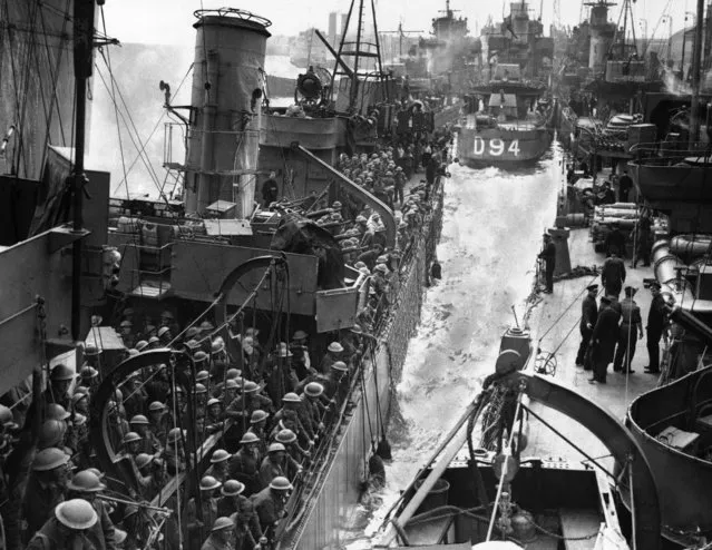 Men of the B.E.F. safely home after their gallant fight in Flanders seen on transport ships at the Quayside on June 6, 1940. Many sorts and sizes of vessels taking part in the grand evacuation from Dunkirk. (Photo by AP Photo)