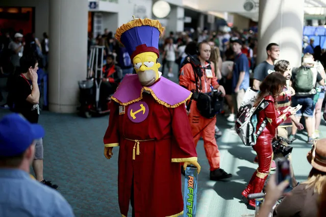 Kenneth McDaniel, who is dressed as Homer Simpson from The Simpsons, is seen during the 2014 Comic-Con International Convention in San Diego, California July 24, 2014. (Photo by Sandy Huffaker/Reuters)