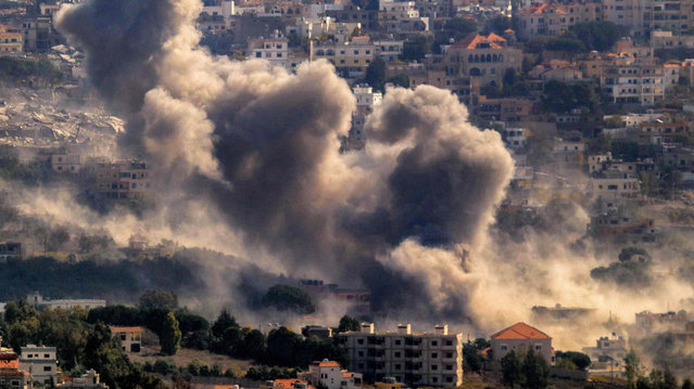 Smoke rises from the site of an Israeli airstrike that targeted an area in the southern Lebanese village of Khiam on October 30, 2024. Israel expanded operations in Lebanon nearly a year after Hezbollah began exchanging fire in support of its ally, the Palestinian Hamas movement after its attack on Israel in October 2023. (Photo by AFP Photo/Stringer)