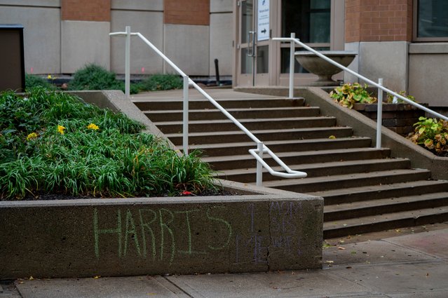 A message written in chalk that reads "Harris" is pictured in Milwaukee, Wisconsin on November 4, 2024. (Photo by Vincent Alban/Reuters)